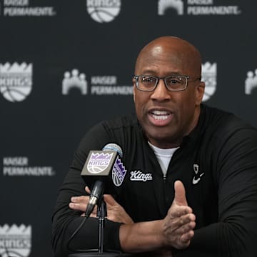 Mar 10, 2024; Sacramento, California, USA; Sacramento Kings head coach Mike Brown talks to media members before the game against the Houston Rockets at Golden 1 Center. Mandatory Credit: Darren Yamashita-Imagn Images