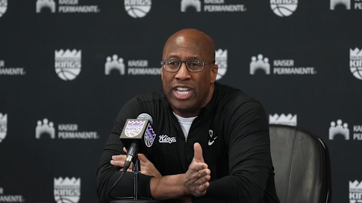 Mar 10, 2024; Sacramento, California, USA; Sacramento Kings head coach Mike Brown talks to media members before the game against the Houston Rockets at Golden 1 Center. Mandatory Credit: Darren Yamashita-Imagn Images