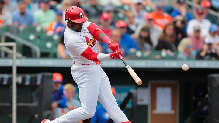 Feb 24, 2025; Jupiter, Florida, USA; Louis Cardinals outfielder Jordan Walker (18) hits a single against the New York Mets during the second inning at Roger Dean Chevrolet Stadium. Mandatory Credit: Sam Navarro-Imagn Images