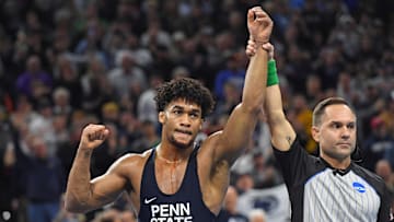 Carter Starocci of the Penn State Nittany Lions celebrates his fifth national title at the 2025 NCAA Men's Wrestling Championship at Wells Fargo Center in Philadelphia.