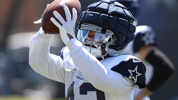 Dallas Cowboys running back Deuce Vaughn makes a catch during training camp at the River Ridge Playing Fields in Oxnard.