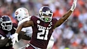 Sep 27, 2025; College Station, Texas, USA; Texas A&M Aggies linebacker Taurean York (21) defends in coverage against the Auburn Tigers during the fourth quarter at Kyle Field. Mandatory Credit: Maria Lysaker-Imagn Images 