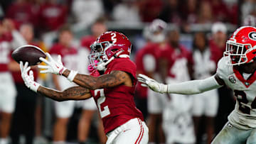Sep 28, 2024; Tuscaloosa, Alabama, USA;  Alabama Crimson Tide wide receiver Ryan Williams (2) reaches for a pass against Georgia Bulldogs defensive back Malaki Starks (24) during the third quarter at Bryant-Denny Stadium. Mandatory Credit: John David Mercer-Imagn Images