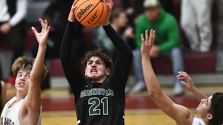Greeneville's Trey ThompsonTrey Thompson (21) grabs the rebound during a high school basketball game between Greeneville and Bearden on Friday, December 16, 2022 in Knoxville, Tenn.Px Greeneville Bearden