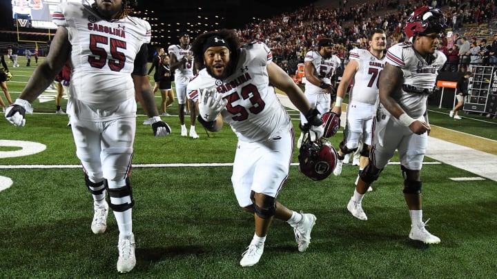 Nov 5, 2022; Nashville, Tennessee, USA; South Carolina Gamecocks offensive lineman Jakai Moore (55) and offensive lineman Vershon Lee (53) celebrate being bowl eligible after a win against the Vanderbilt Commodores at FirstBank Stadium. Mandatory Credit: Christopher Hanewinckel-USA TODAY Sports