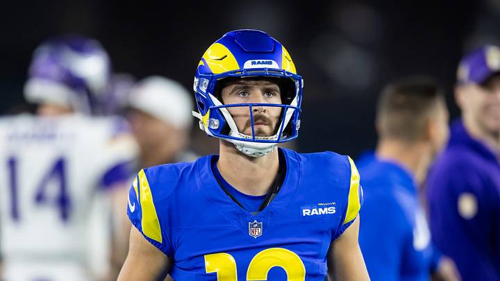Jan 13, 2025; Glendale, AZ, USA; Los Angeles Rams quarterback Stetson Bennett (13) against the Minnesota Vikings during an NFC wild card game at State Farm Stadium. Mandatory Credit: Mark J. Rebilas-Imagn Images