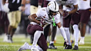 Nov 22, 2025; Boulder, Colorado, USA; Arizona State Sun Devils defensive back Keith Abney II (1) recovers a fumble in the fourth quarter against the Colorado Buffaloes at Folsom Field. Mandatory Credit: Ron Chenoy-Imagn Images