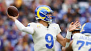Oct 12, 2025; Baltimore, Maryland, USA; Los Angeles Rams quarterback Matthew Stafford (9) passes the ball against the Baltimore Ravens during the second half of the game at M&T Bank Stadium. Mandatory Credit: Peter Casey-Imagn Images