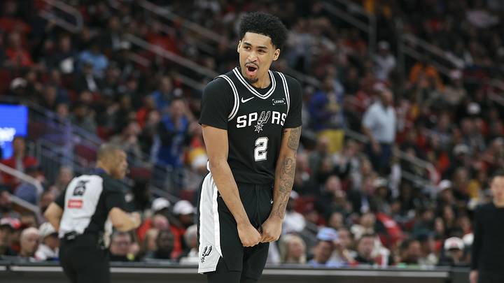 Jan 28, 2026; Houston, Texas, USA; San Antonio Spurs guard Dylan Harper (2) reacts after scoring a basket during the third quarter against the Houston Rockets at Toyota Center. Mandatory Credit: Troy Taormina-Imagn Images