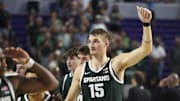 Nov 25, 2025; Fort Myers, Florida, USA; Michigan State Spartans center Carson Cooper (15) reacts after beating the East Carolina Pirates at Suncoast Credit Union Arena. Mandatory Credit: Nathan Ray Seebeck-Imagn Images