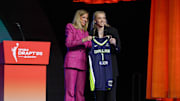 Paige Bueckers poses with WNBA commissioner Cathy Engelbert after being selected with the No. 1 overall pick to the Dallas Wings in the 2025 WNBA Draft.