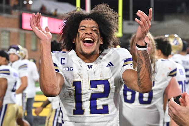 Washington receiver Denzel Boston celebrates after the Huskies' comeback victory over Maryland.