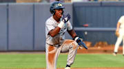 May 31, 2025; Oxford, MS, USA; Georgia Tech Yellowjackets catcher Vahn Lackey (25) reacts after stealing second base during the first inning against the Murray State Racers. Mandatory Credit: Petre Thomas-Imagn Images