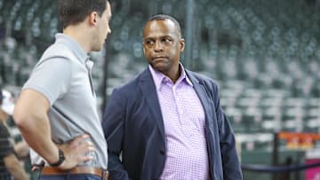 Aug 31, 2024; Houston, Texas, USA; Houston Astros general manager Dana Brown (right) talks before the game against the Kansas City Royals at Minute Maid Park. Mandatory Credit: Troy Taormina-Imagn Images