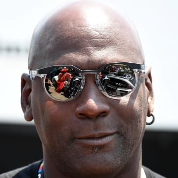 Jun 24, 2023; Nashville, Tennessee, USA; Team 23XI owner Michael Jordan looks on from pit road during qualifying before the Ally 400 at Nashville Superspeedway. Mandatory Credit: Christopher Hanewinckel-USA TODAY Sports