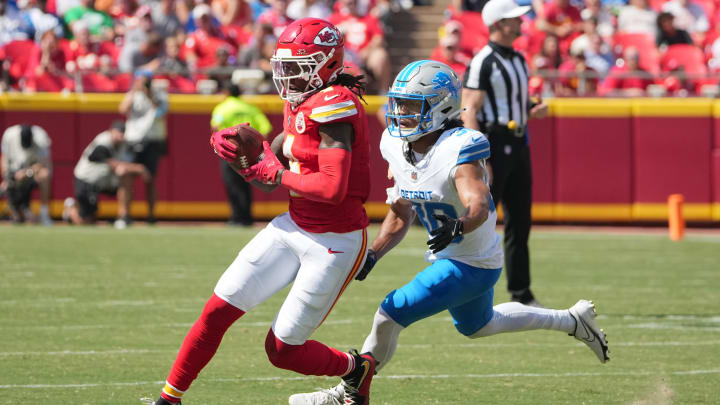 Aug 17, 2024; Kansas City, Missouri, USA; Kansas City Chiefs wide receiver Rashee Rice (4) catches a pass as Detroit Lions cornerback Khalil Dorsey (30) defends during the first half at GEHA Field at Arrowhead Stadium. Mandatory Credit: Denny Medley-USA TODAY Sports