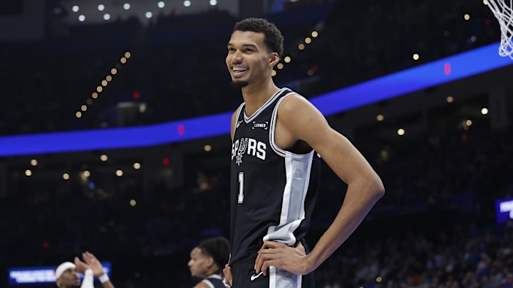 Spurs forward Victor Wembanyama smiles after a play against the Thunder on Christmas. Spurs forward Victor Wembanyama smiles after a play against the Thunder on Christmas.