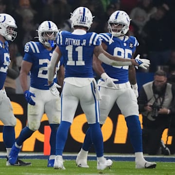 Nov 9, 2025; Berlin, Germany; Indianapolis Colts running back Jonathan Taylor (28) reacts with teammates against the Atlanta Falcons during the NFL Berlin Game at Olympic Stadium. 