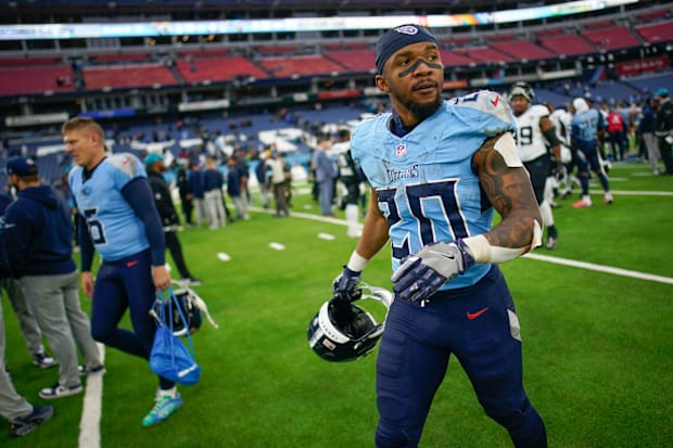 Tennessee Titans running back Tony Pollard (20) walks off the field after the game at Nissan Stadium