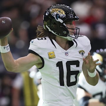 Nov 9, 2025; Houston, Texas, USA; Jacksonville Jaguars quarterback Trevor Lawrence (16) attempts a pass during the fourth quarter against the Houston Texans at NRG Stadium. Mandatory Credit: Troy Taormina-Imagn Images