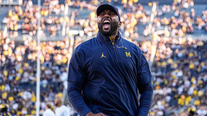 Michigan head coach Sherrone Moore fires up the student section during warm up ahead of the New Mexico game at Michigan Stadium in Ann Arbor on Saturday, August 30, 2025.