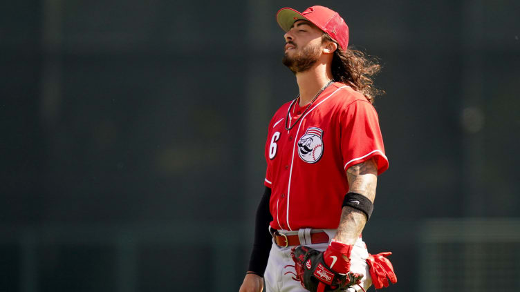 Cincinnati Reds second baseman Jonathan India (6) takes a deep breath during a spring training game.