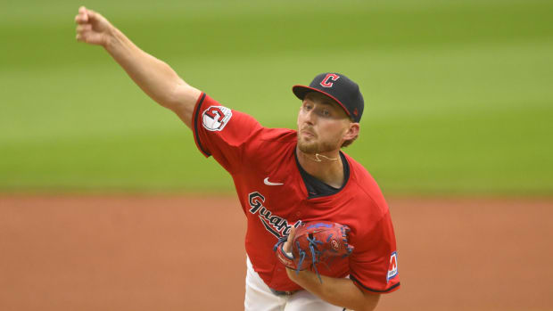 Guardians starting pitcher Tanner Bibee (28) delivers a pitch.