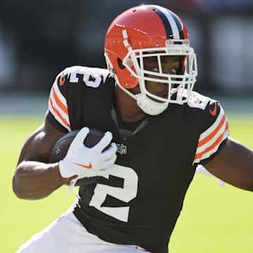 Sep 8, 2024; Cleveland, Ohio, USA; Cleveland Browns wide receiver Amari Cooper (2) runs with the ball after a catch as Dallas Cowboys cornerback Caelen Carson (21) defends during the first quarter at Huntington Bank Field. Mandatory Credit: Ken Blaze-Imagn Images