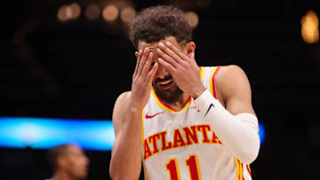 Dec 2, 2024; Atlanta, Georgia, USA; Atlanta Hawks guard Trae Young (11) reacts after a foul call against the New Orleans Pelicans in the fourth quarter at State Farm Arena. Mandatory Credit: Brett Davis-Imagn Images