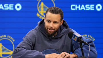 Jan 25, 2025; San Francisco, California, USA; Golden State Warriors guard Stephen Curry (30) talks with media members after the game against the Los Angeles Lakers at Chase Center. Mandatory Credit: Darren Yamashita-Imagn Images