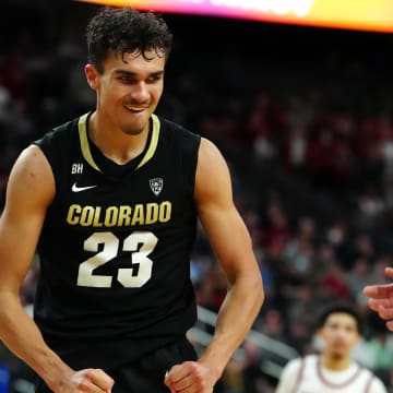 Colorado Buffaloes forward Tristan da Silva (23) celebrates after making a play against the Washington State Cougars during the second half at T-Mobile Arena. 