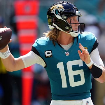 Sep 8, 2024; Miami Gardens, Florida, USA;  Jacksonville Jaguars quarterback Trevor Lawrence (16) drops back to pass against the Miami Dolphins during the third quarter at Hard Rock Stadium.