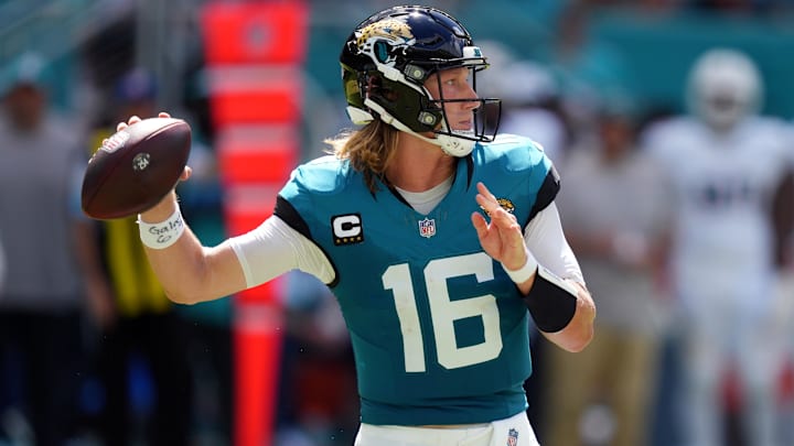 Sep 8, 2024; Miami Gardens, Florida, USA;  Jacksonville Jaguars quarterback Trevor Lawrence (16) drops back to pass against the Miami Dolphins during the third quarter at Hard Rock Stadium.