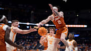 Texas guard Chendall Weaver (2) nearly grabs the rebound against Tennessee forward Igor Milicic Jr. (7) during the second half of their quarterfinal game of the SEC Men's Basketball Tournament at Bridgestone Arena in Nashville, Tenn., Friday, March 14, 2025.