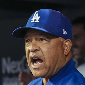 Dodgers manager Dave Roberts (30) reacts in the dugout against the Atlanta Braves during the second inning at Truist Park on May 3.