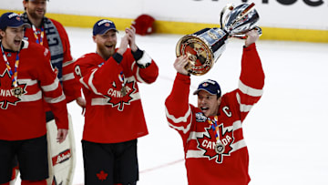 Feb 20, 2025; Boston, MA, USA; [Imagn Images direct customers only] Team Canada forward Sydney Crosby (87) lifts the trophy after defeating the United States during the 4 Nations Face-Off ice hockey championship game at TD Garden. Mandatory Credit: Winslow Townson-Imagn Images