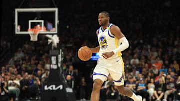 Apr 8, 2025; Phoenix, Arizona, USA; Golden State Warriors forward Jonathan Kuminga (00) against the Phoenix Suns at Footprint Center. Mandatory Credit: Mark J. Rebilas-Imagn Images