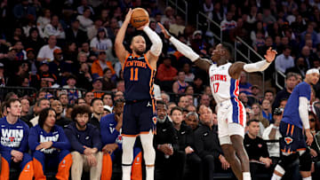 Apr 21, 2025; New York, New York, USA; New York Knicks guard Jalen Brunson (11) shoots a three point shot against Detroit Pistons guard Dennis Schroder (17) during the second quarter of game two of the first round of the 2024 NBA Playoffs at Madison Square Garden. Mandatory Credit: Brad Penner-Imagn Images