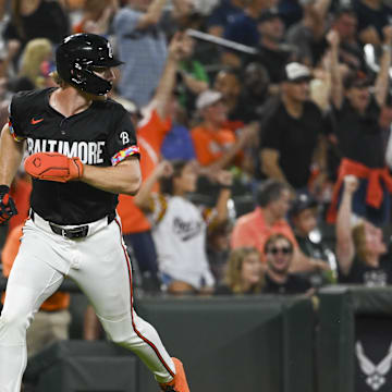 Baltimore Orioles shortstop Gunnar Henderson (2) runs home on outfielder Anthony Santander (not pictured) first inning home run against the Detroit Tigers at Oriole Park at Camden Yards in 2024.