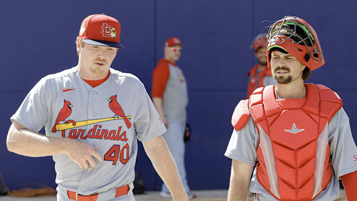 St. Louis Cardinals catcher prospect Grayson Tarlow (right) walks with pitcher Hunter Dobbins.