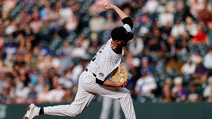 Jun 18, 2024; Denver, Colorado, USA; Colorado Rockies starting pitcher Austin Gomber (26) pitches in the first inning against the Los Angeles Dodgers at Coors Field. Mandatory Credit: Isaiah J. Downing-USA TODAY Sports