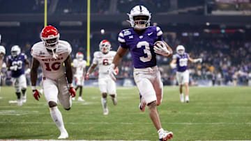 Dec 26, 2024; Phoenix, AZ, USA; Kansas State Wildcats running back Dylan Edwards (3) runs for a touchdown against the Rutgers Scarlet Knights during the second half of the Rate Bowl at Chase Field. Mandatory Credit: Mark J. Rebilas-Imagn Images
