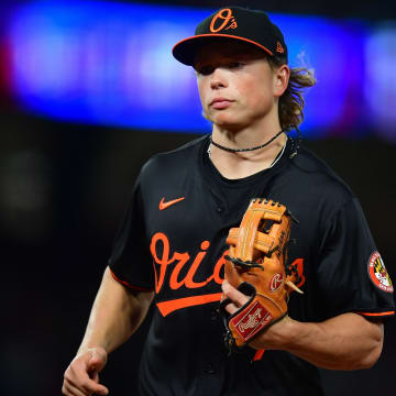 Apr 23, 2024; Anaheim, California, USA; Baltimore Orioles second baseman Jackson Holliday (7) returns to the dugout following the fourth inning against the Los Angeles Angels at Angel Stadium.