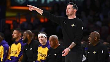 Apr 11, 2025; Los Angeles, California, USA; Los Angeles Lakers head coach JJ Redick reacts against the Houston Rockets during the second half at Crypto.com Arena. Mandatory Credit: Jonathan Hui-Imagn Images