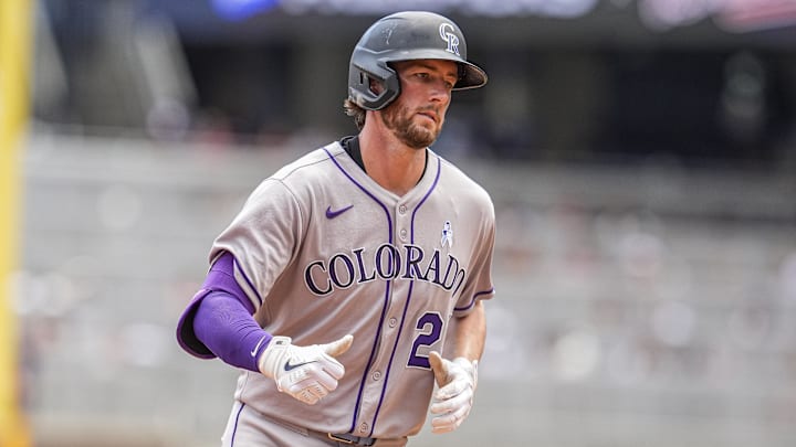 Jun 15, 2025; Cumberland, Georgia, USA; Colorado Rockies third baseman Ryan McMahon (24) runs after hitting a home run against the Atlanta Braves during the seventh inning at Truist Park.