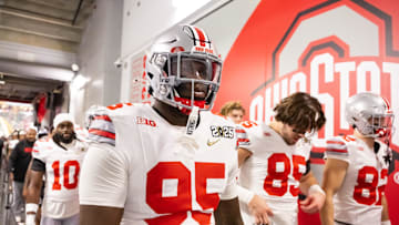 Jan 20, 2025; Atlanta, GA, USA; Ohio State Buckeyes defensive tackle Tywone Malone Jr. (95) against the Notre Dame Fighting Irish during the CFP National Championship college football game at Mercedes-Benz Stadium. Mandatory Credit: Mark J. Rebilas-Imagn Images