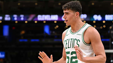 Oct 12, 2025; Boston, Massachusetts, USA; Boston Celtics center Luka Garza (52) reacts after a foul during the second half of a game against the Cleveland Cavaliers at TD Garden. Mandatory Credit: Brian Fluharty-Imagn Images