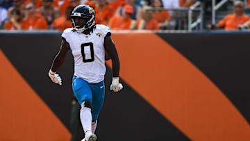 Sep 14, 2025; Cincinnati, Ohio, USA; Jacksonville Jaguars linebacker Devin Lloyd (0) reacts after intercepting the ball in the second half against the Cincinnati Bengals at Paycor Stadium. 