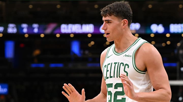 Oct 12, 2025; Boston, Massachusetts, USA; Boston Celtics center Luka Garza (52) reacts after a foul during the second half of a game against the Cleveland Cavaliers at TD Garden. Mandatory Credit: Brian Fluharty-Imagn Images