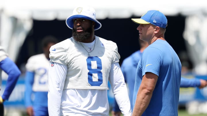 Jul 31, 2024; Los Angeles, CA, USA;  Los Angeles Rams defensive end Jared Verse (8) listens to outside linebackers coach Joe Coniglio during training camp at Loyola Marymount University. Mandatory Credit: Kiyoshi Mio-USA TODAY Sports